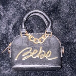 Bebe Black and Gold Mini Handbag